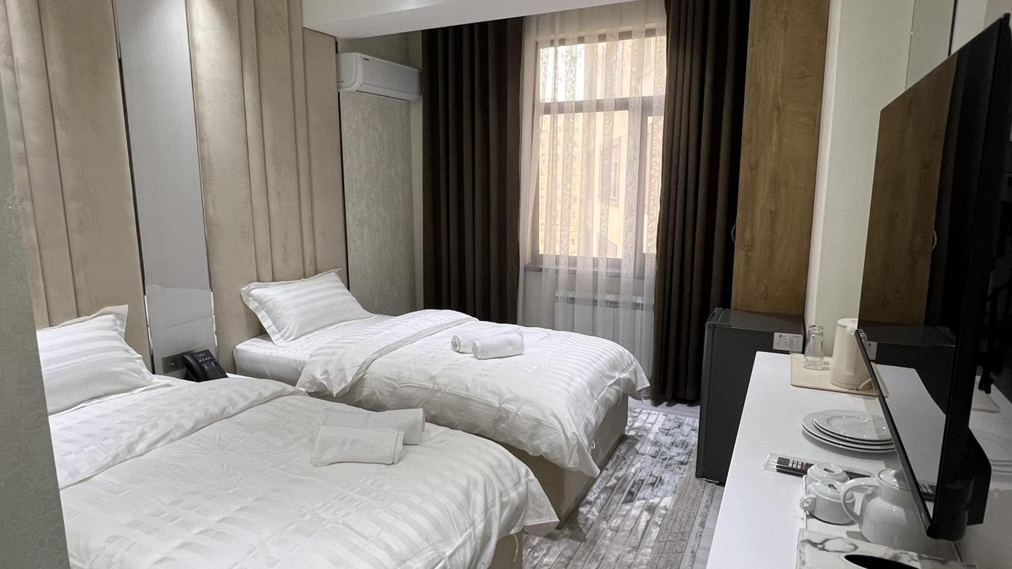 Hotel Panorama ดูแชนเบอ ภายนอก รูปภาพ